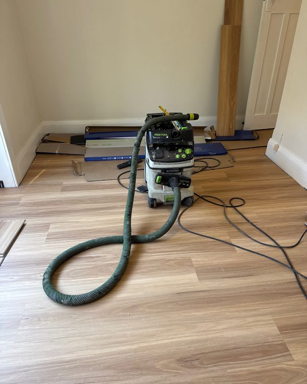 M-class dust extractor running on site to keep the work area clean